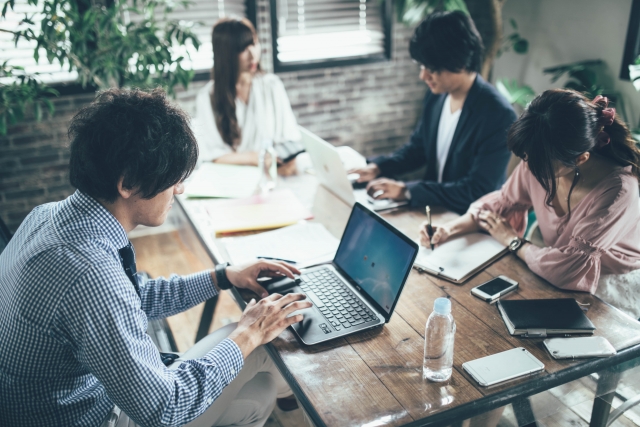 Japanese people having a business meeting