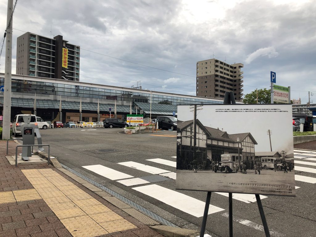 A black and white picture of a station in front of the station today 