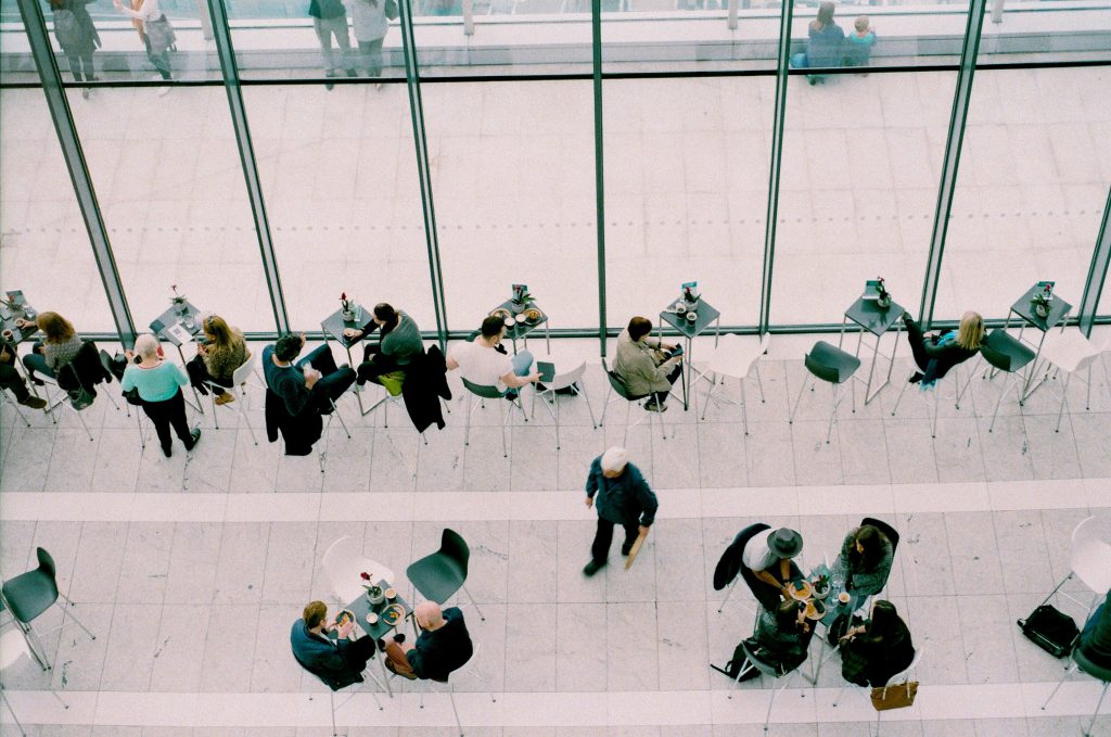 People having lunch in a cafeteria