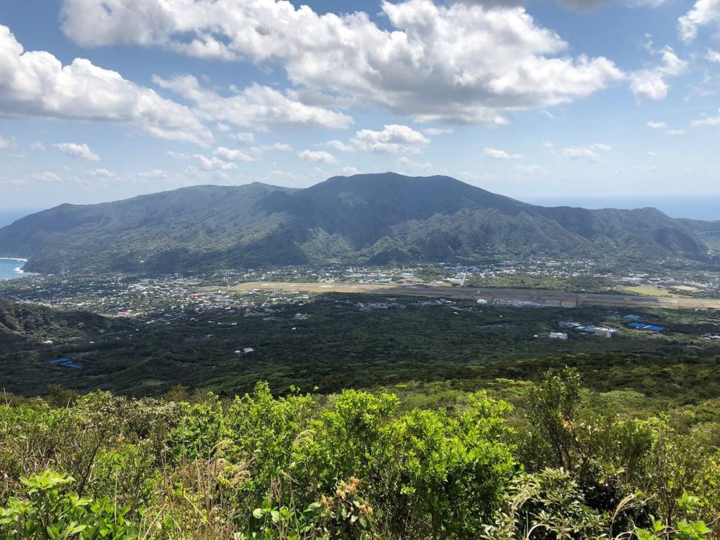 A view on a very green island and its mountains