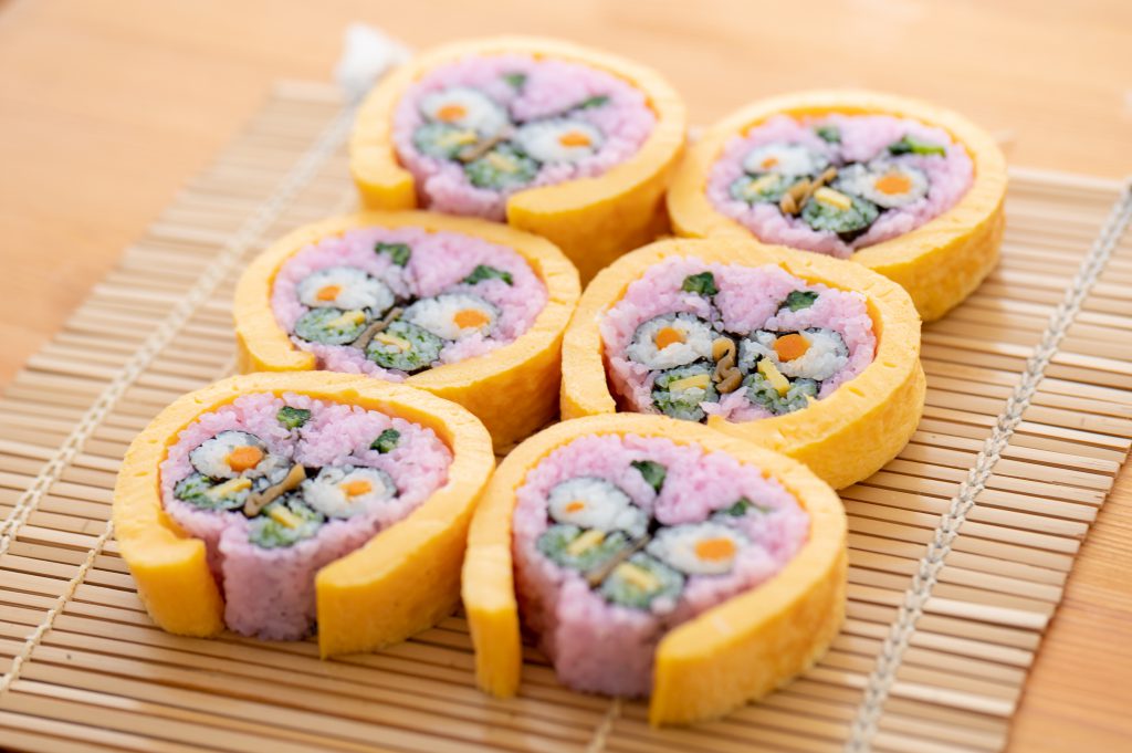 Butterfly-patterned big sushi rolls. 