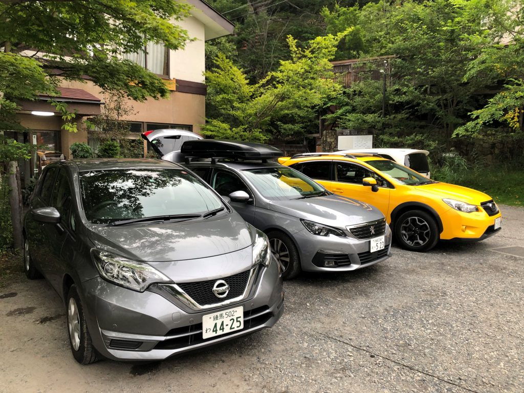 Japanese cars in a parking lot