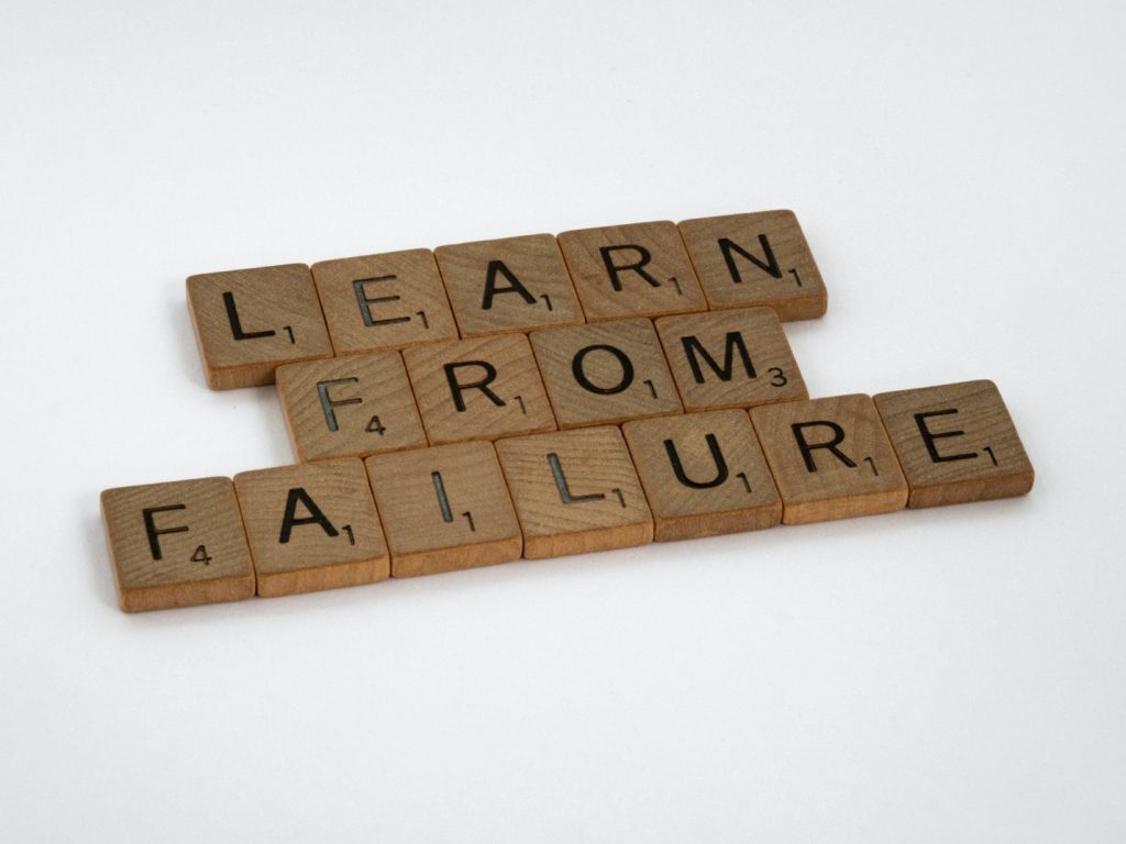 Scrabble letters spell "Learn from failure"