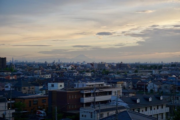 View of a Japanese town with a view on Mt. Fuji