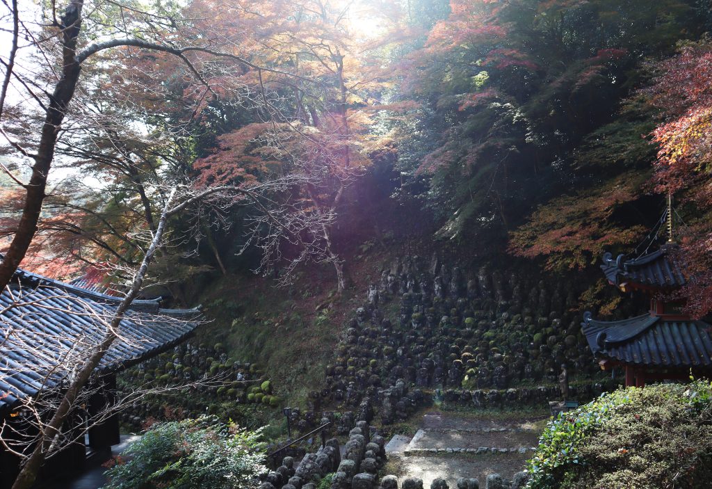 Stone Buddhist statues and a pagoda