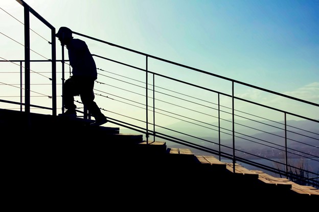 A man is climbing stairs